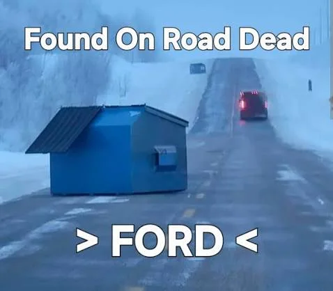 Blue dumpster on a snowy road. Found On Road Dead. FORD.